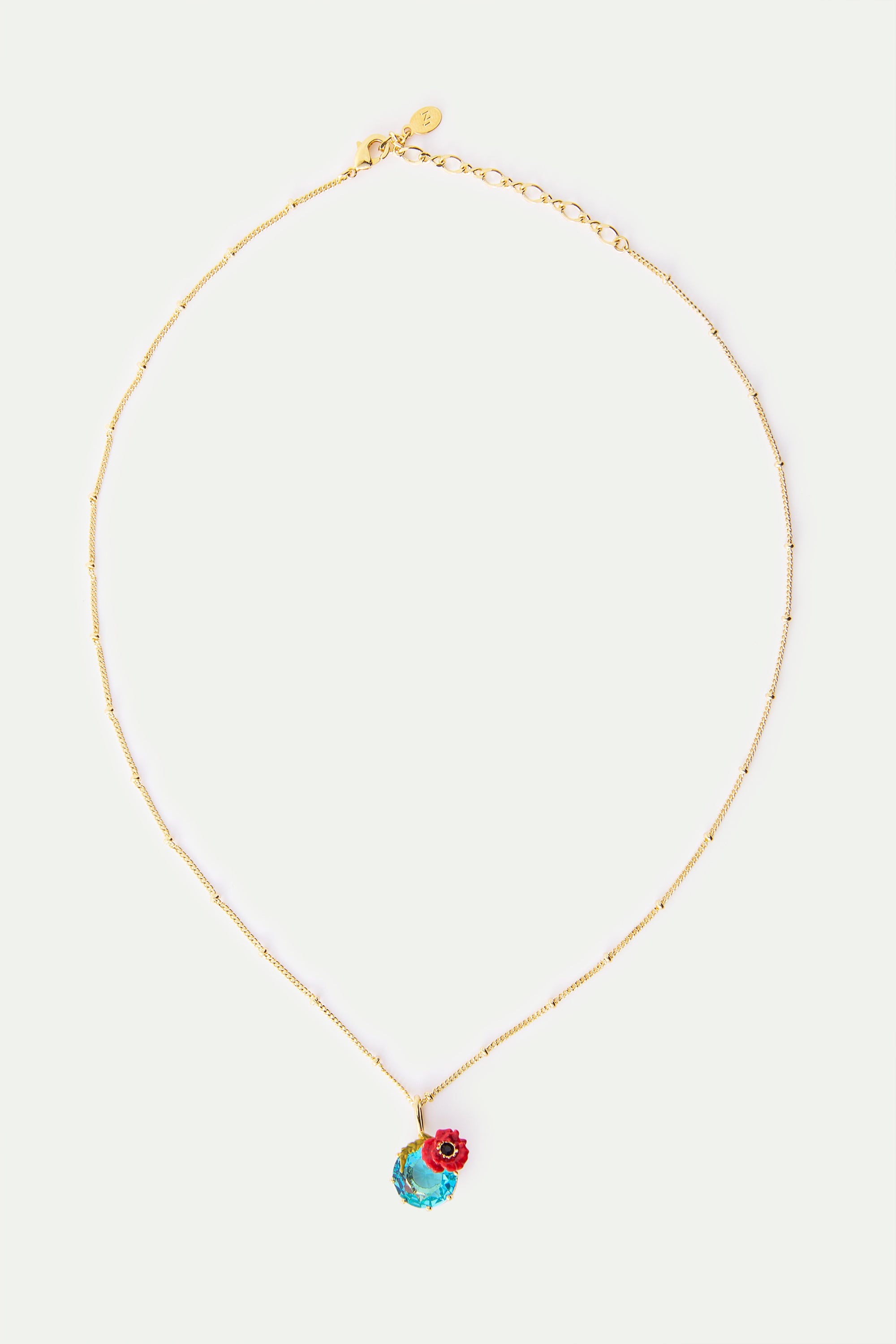 Pendant necklace with round blue stone and poppie