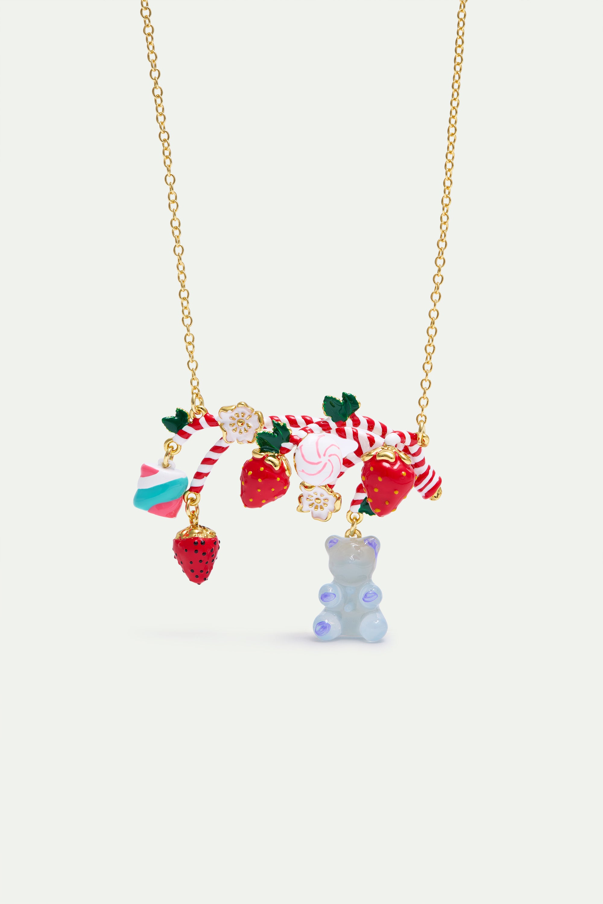 Statement necklace with candy cane, strawberry, marshmallow, blue teddy bear sweet and white flowers
