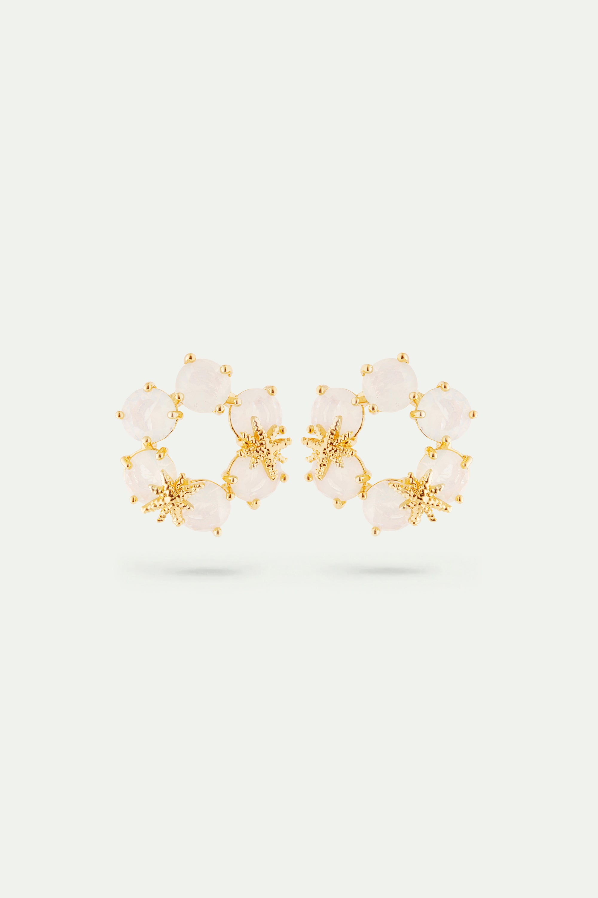 Opalescent white Diamantine six stone earrings with fine stars