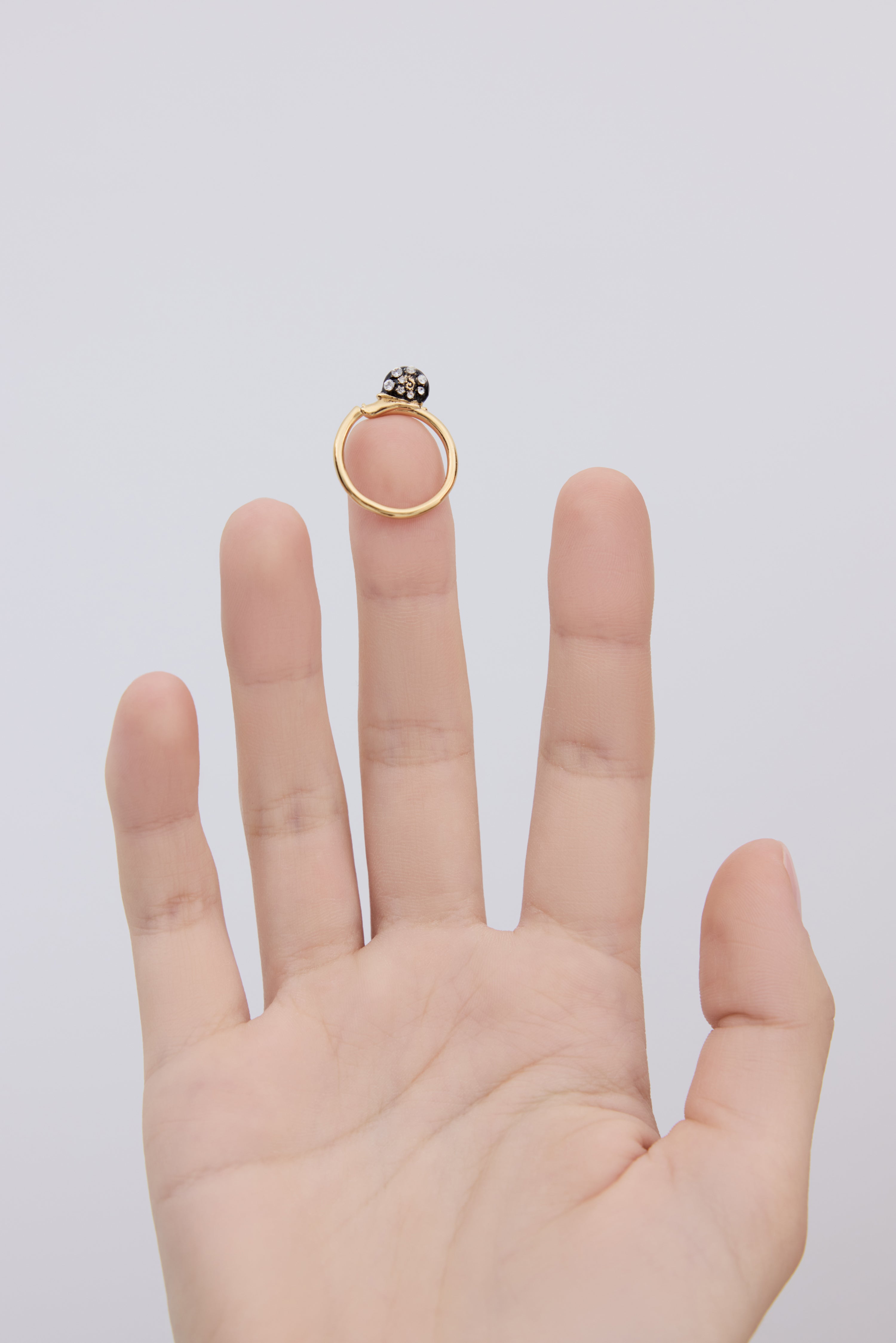 Black and gold snail adjustable ring with crystals