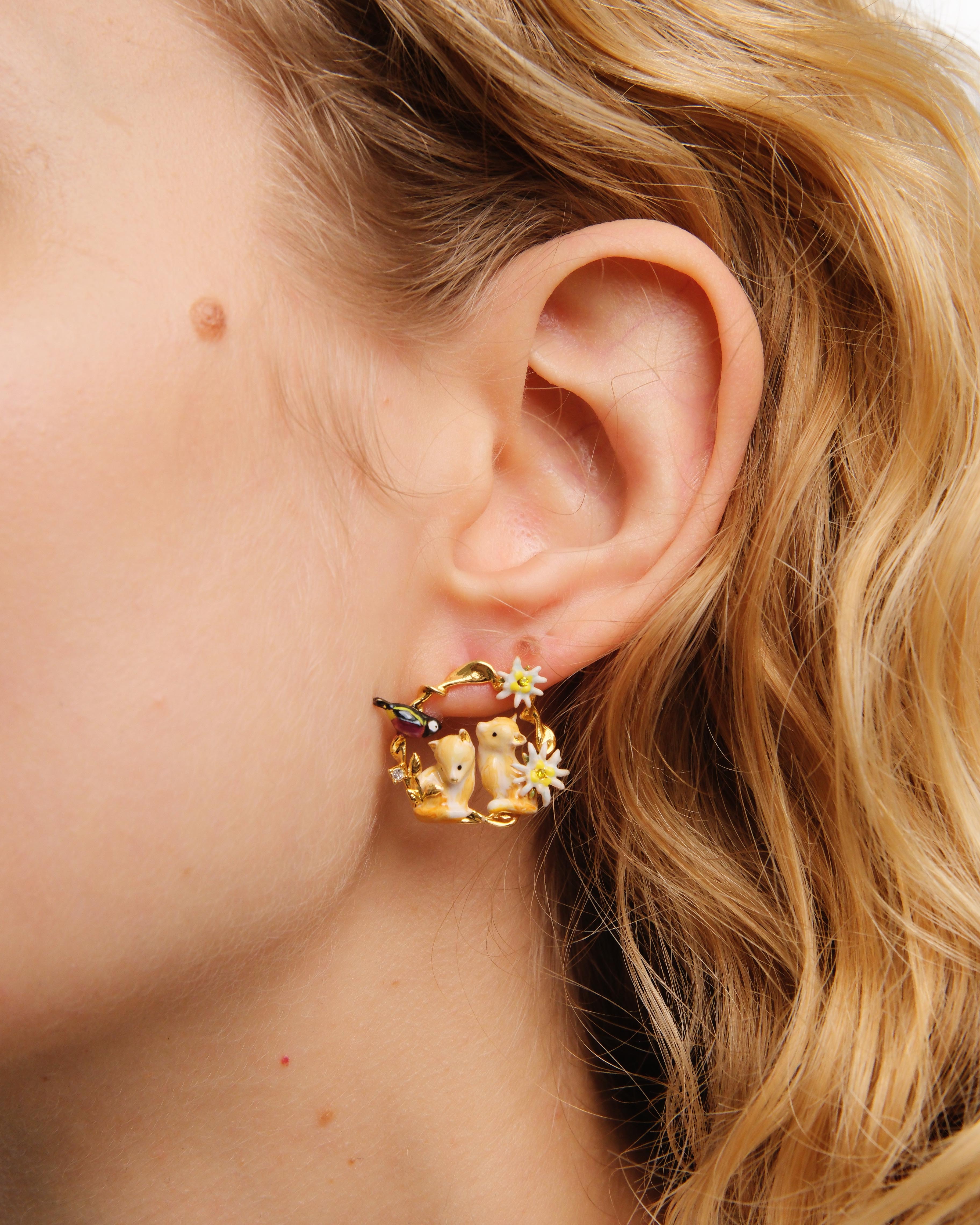 Asymmetrical edelweiss flower, arctic fox and varied tit hoop earrings