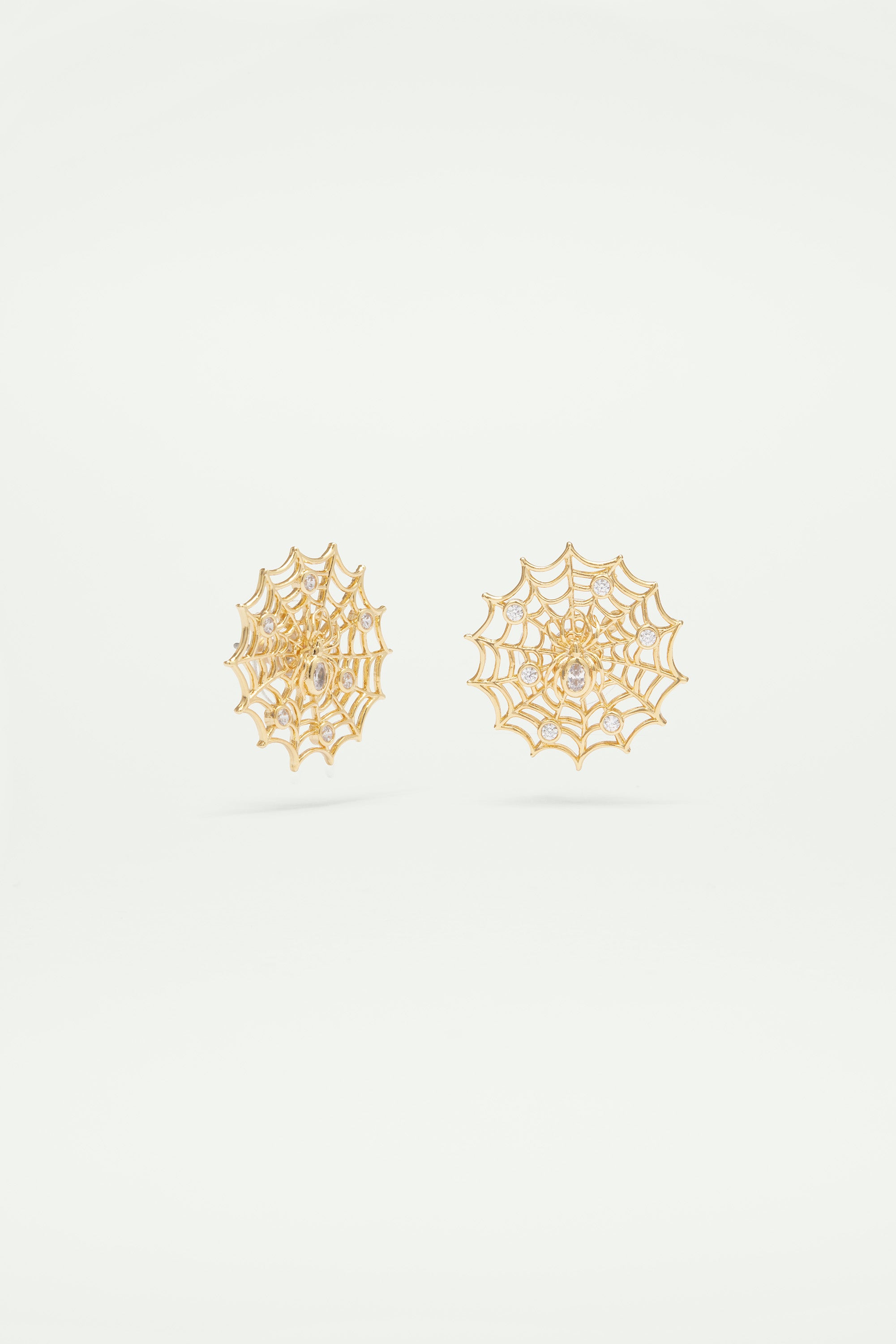 Golden spider's web and crystal earrings