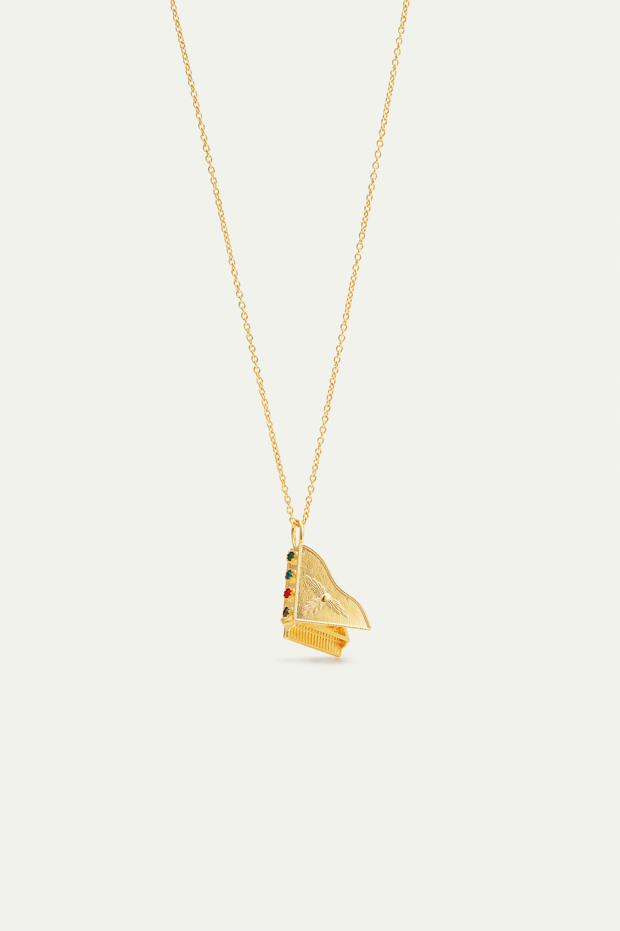 Gold piano pendant necklace