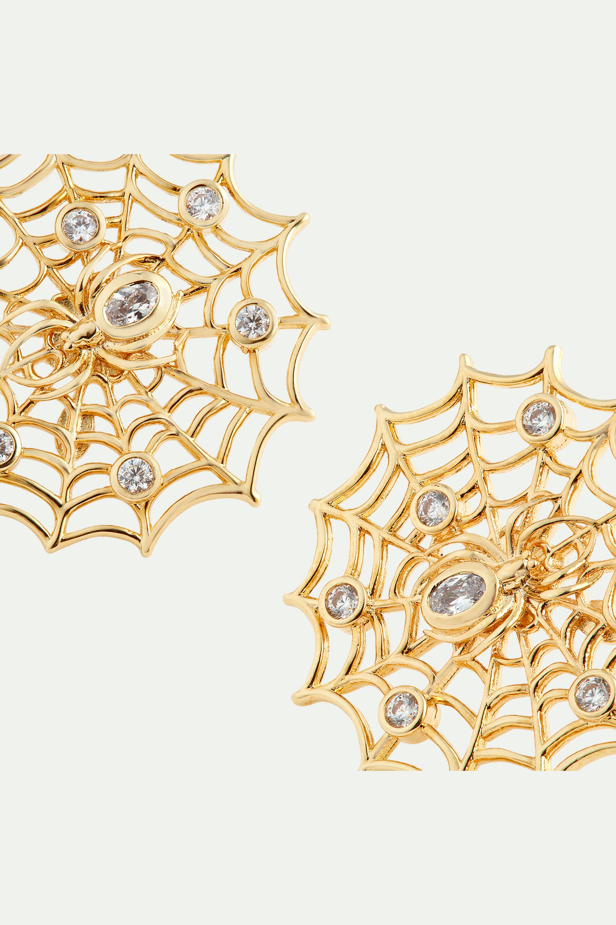 Golden spider's web and crystal earrings