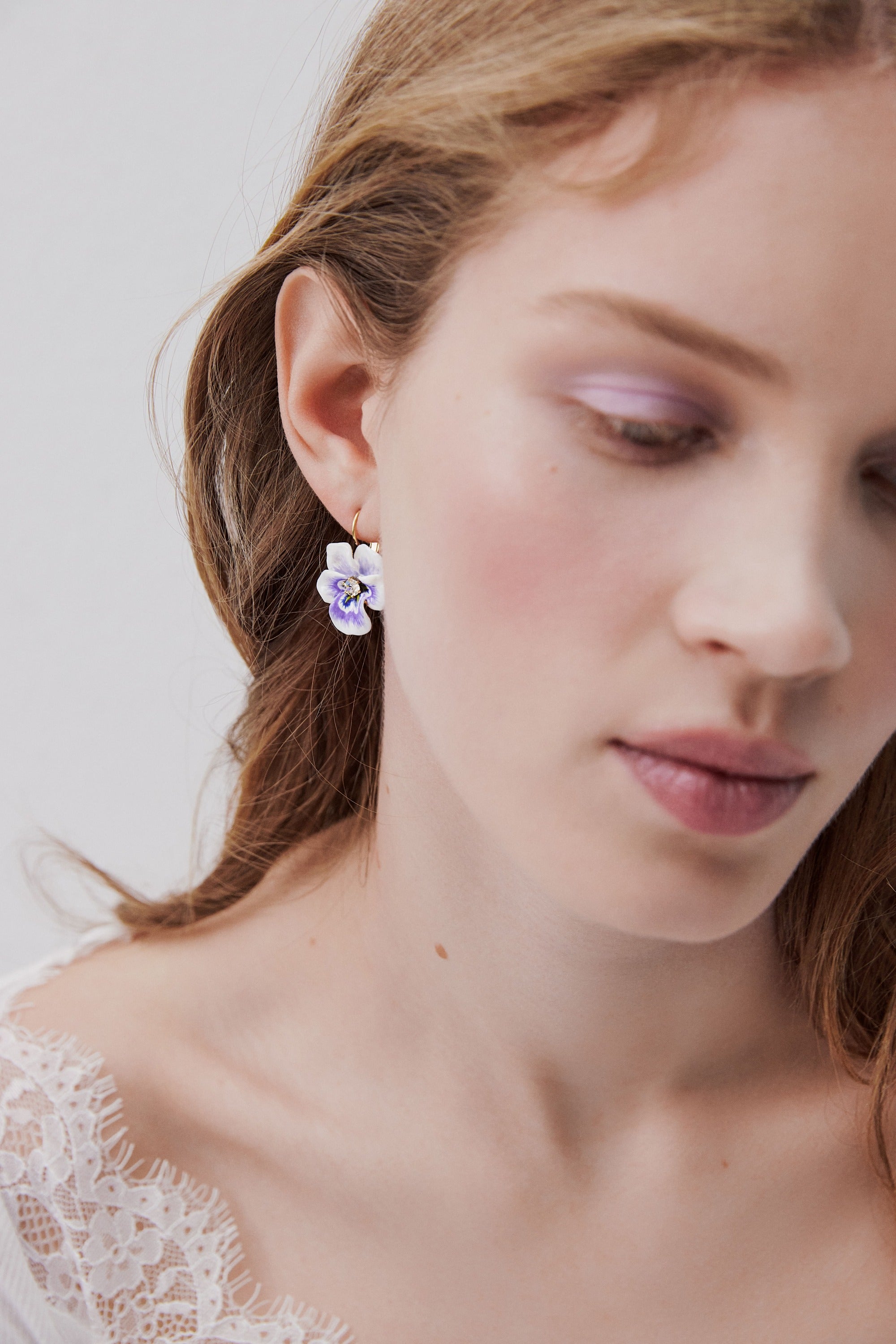 Purple pansy and cut crystal sleeper earrings