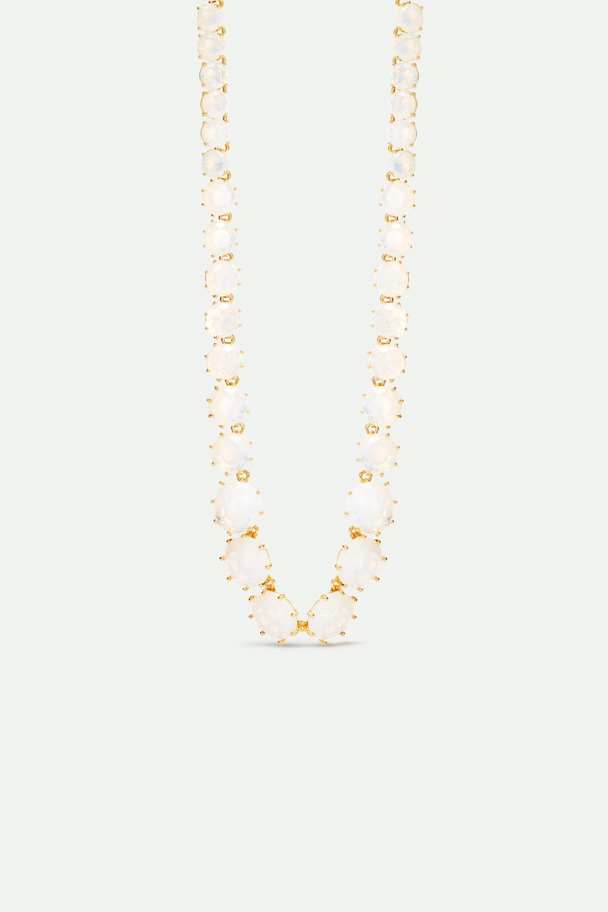 Opalescent white Diamantine round stone long necklace