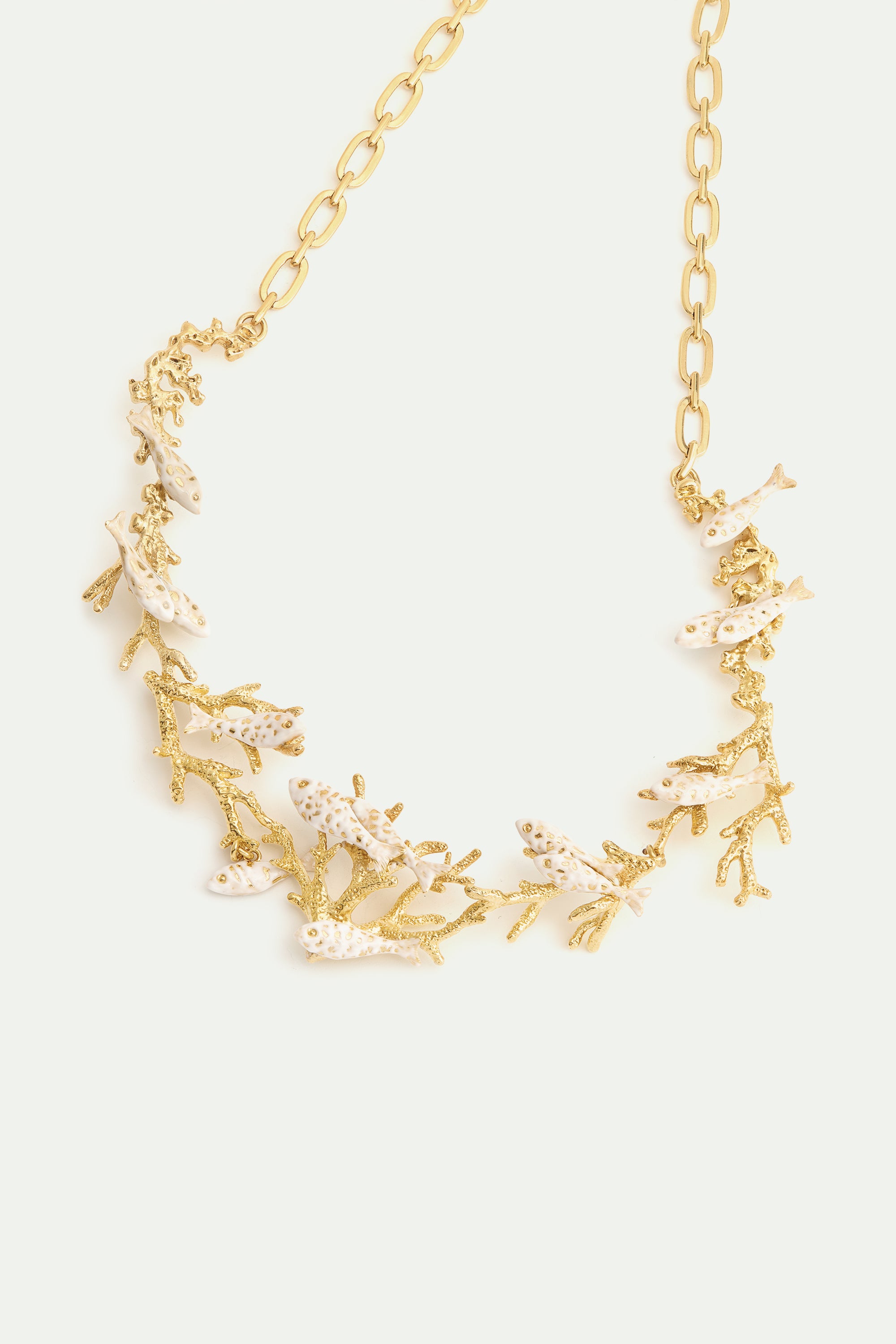 Golden coral and white fish statement necklace
