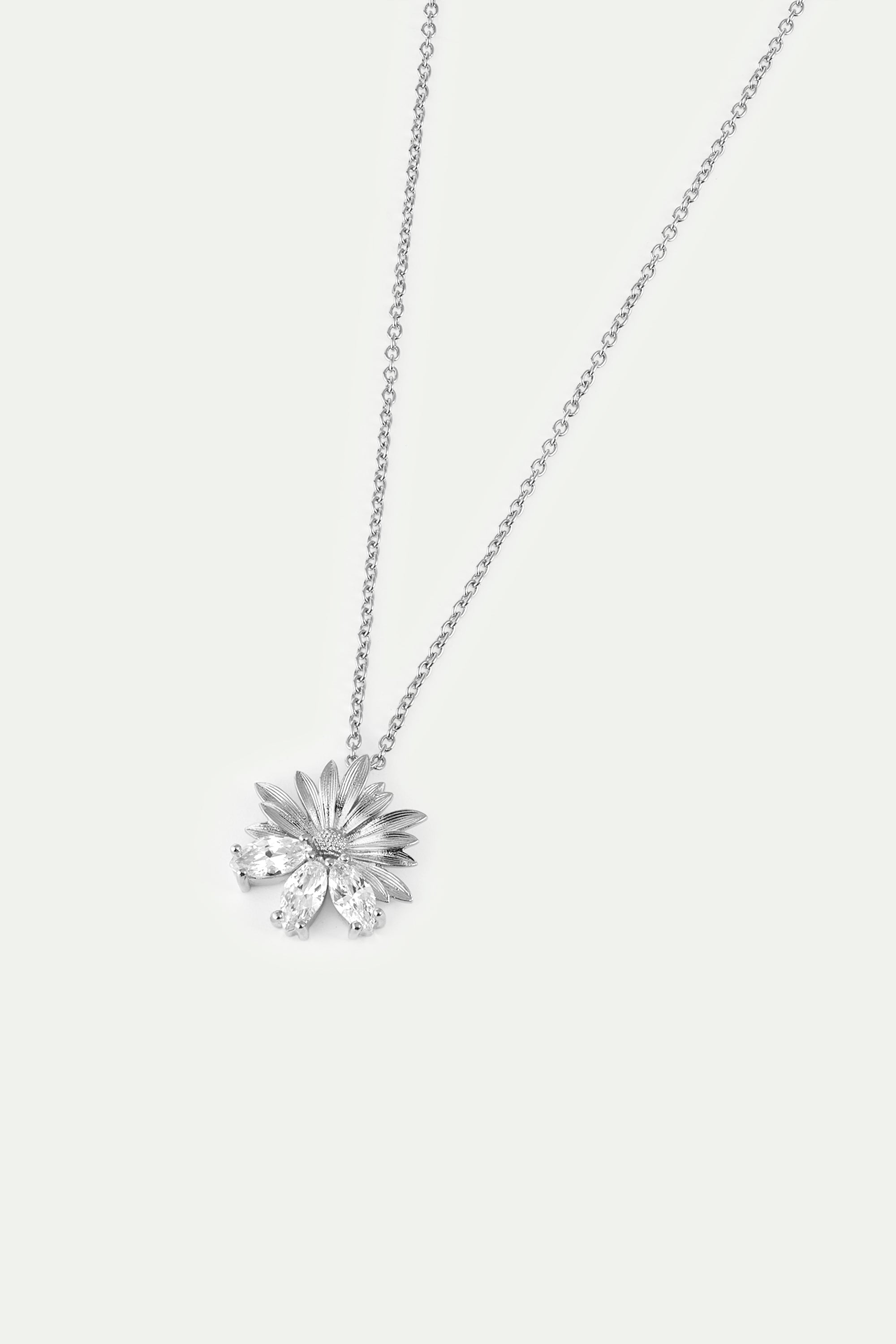 Silver pendant necklace with daisies and white stones