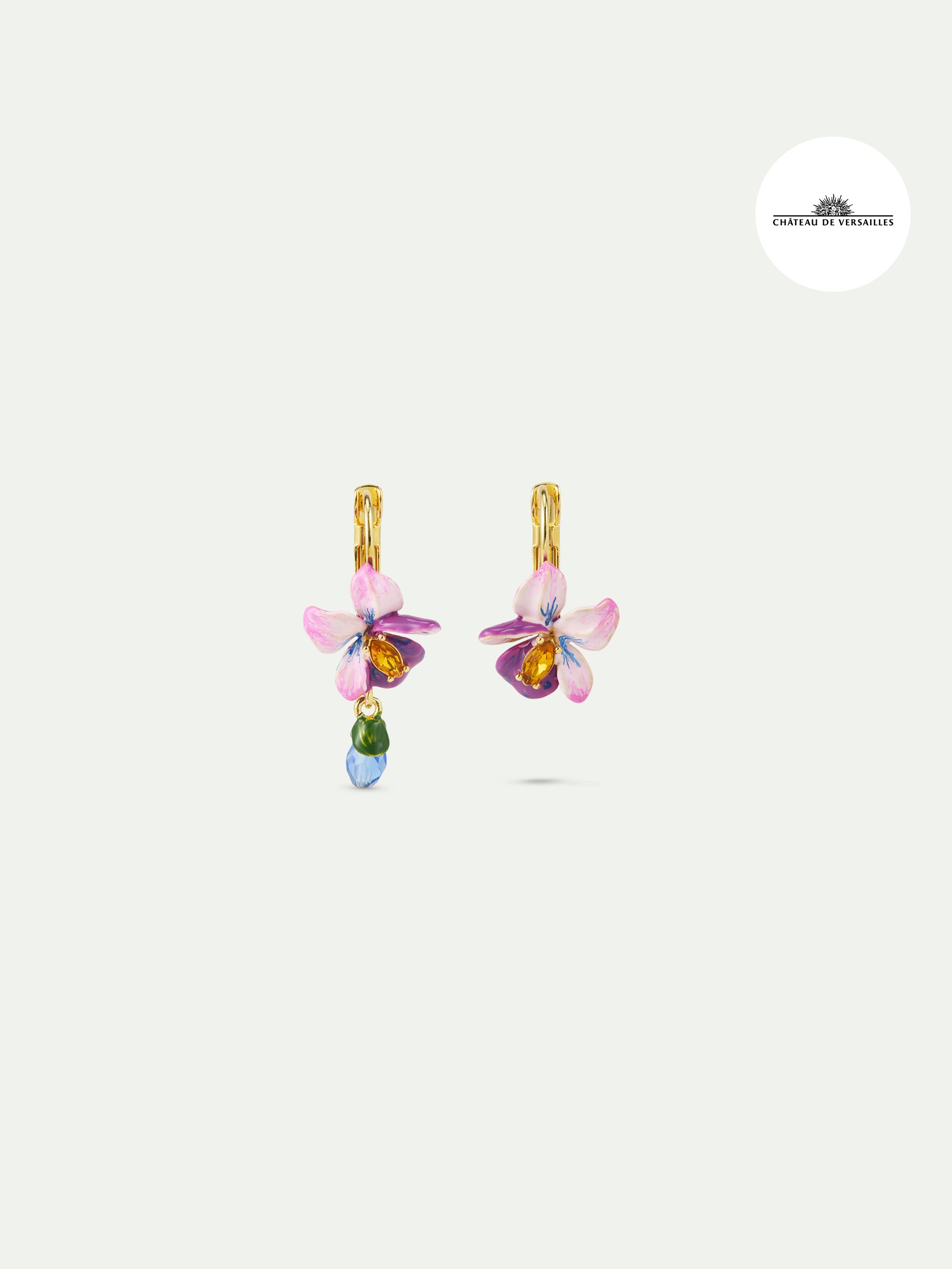 Asymmetrical violet flower and blue stone earrings