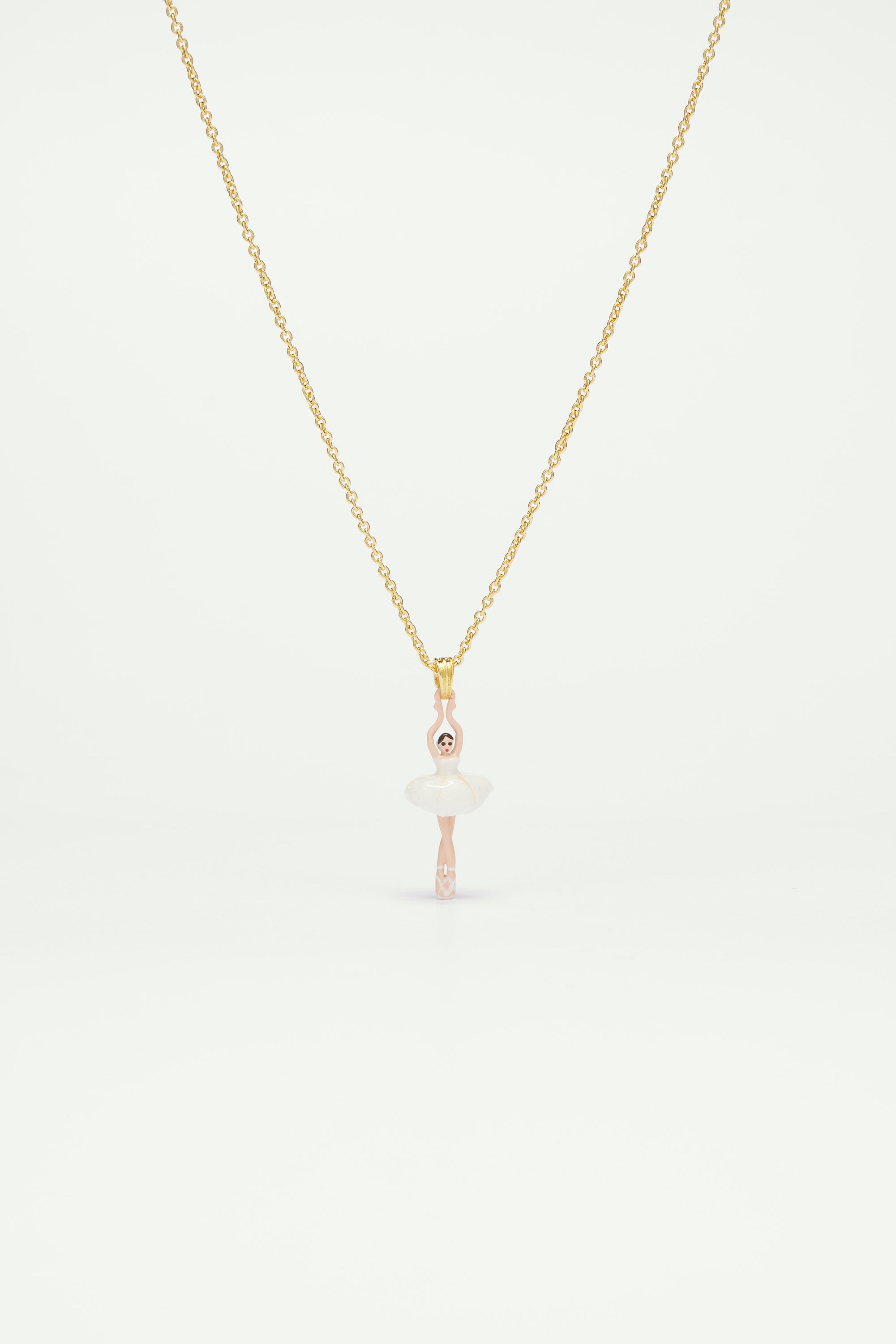 Necklace featuring mini ballerina in a white tutu