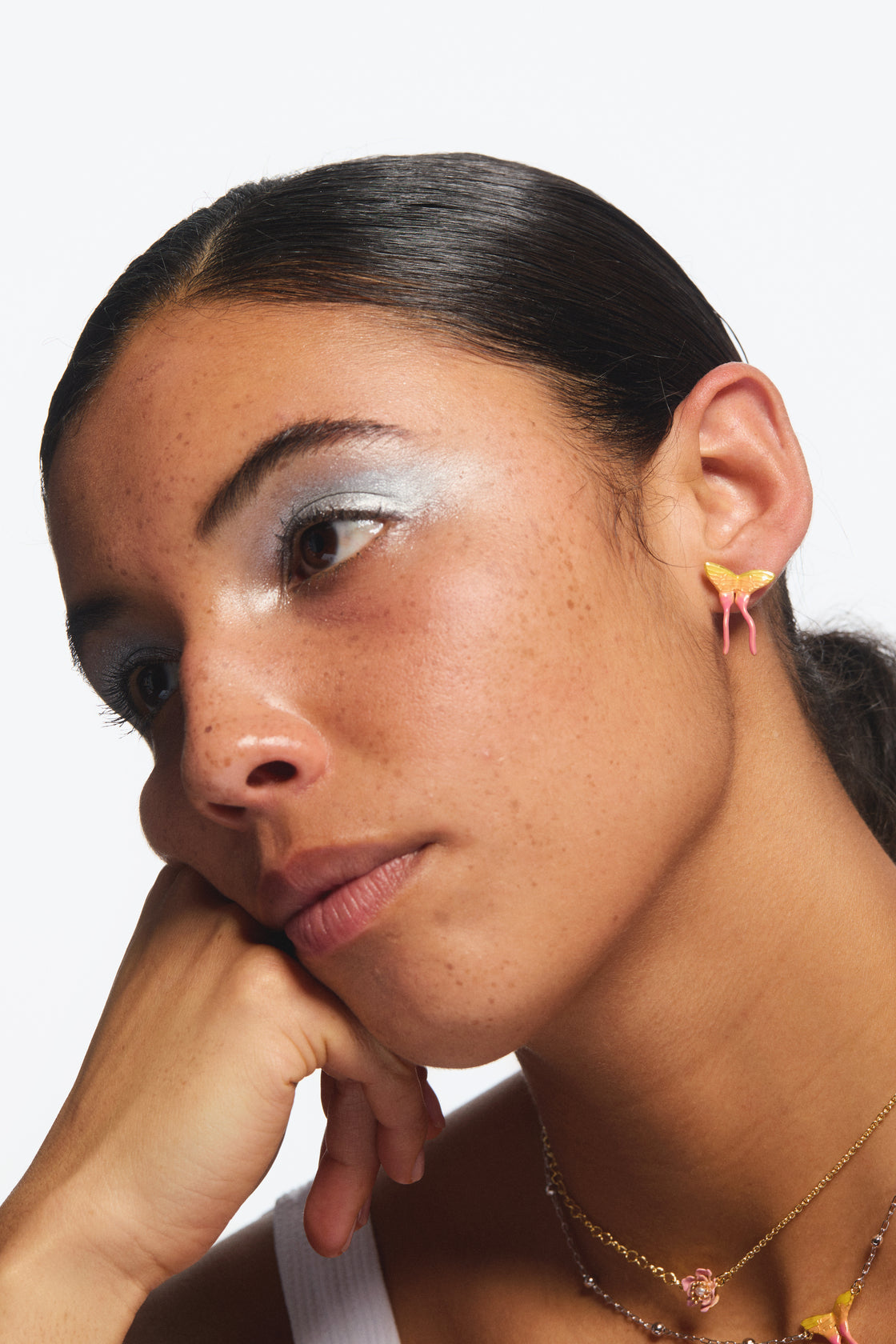 Pink magnolia flower and pink and yellow butterfly asymmetrical earrings