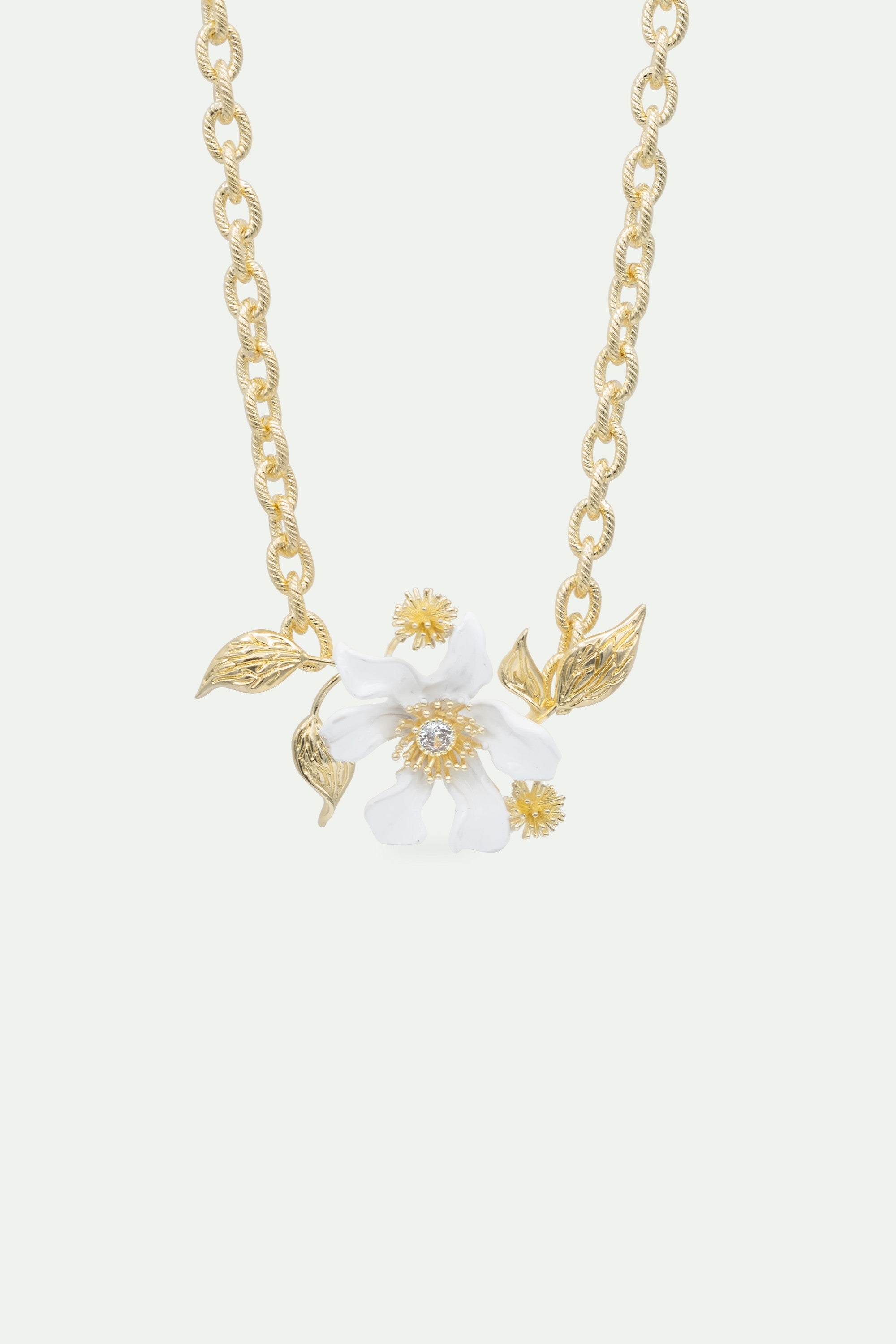 Large white clematis flower, Japanese kerria and laurel necklace
