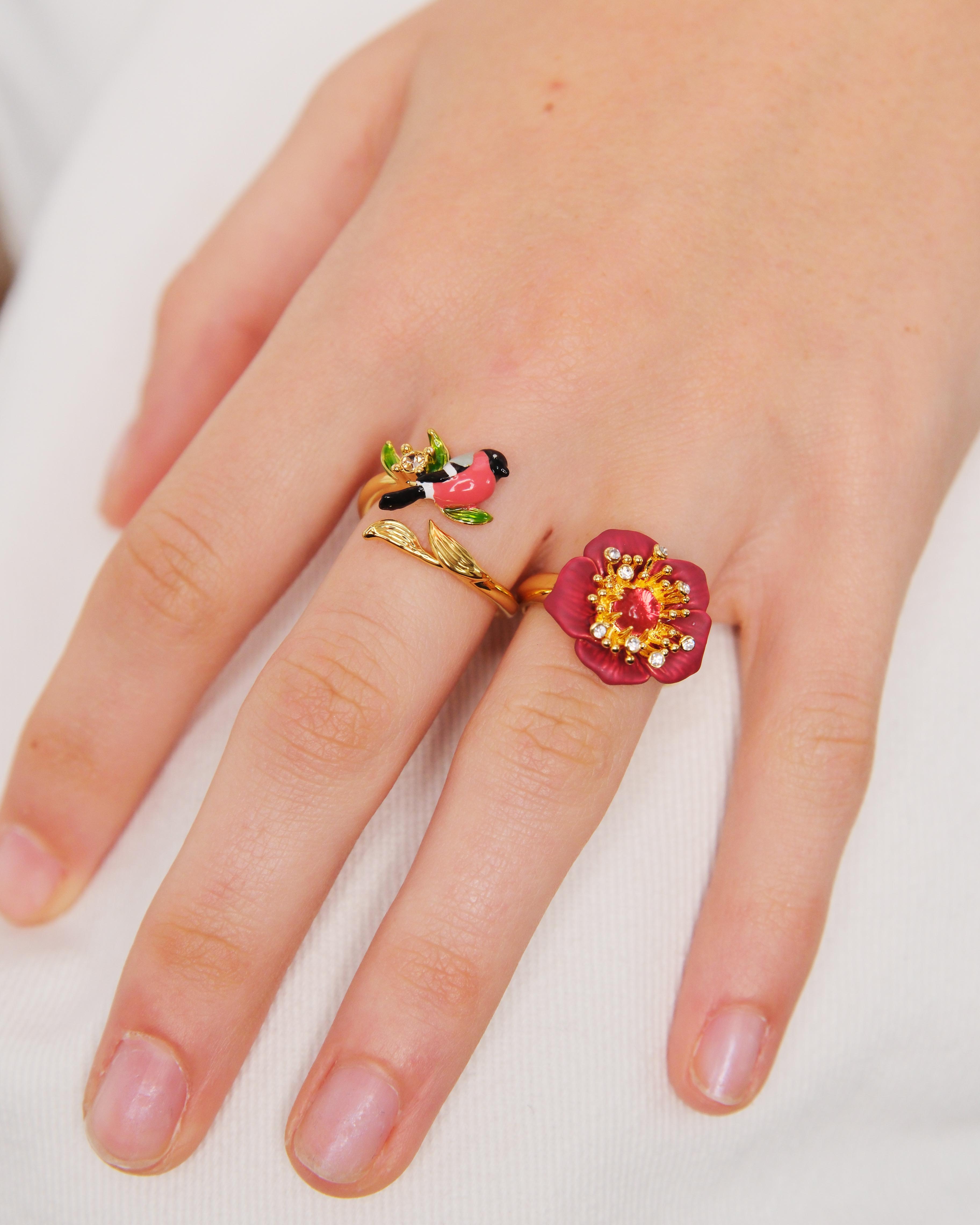 Fine ring with red hellebore flower