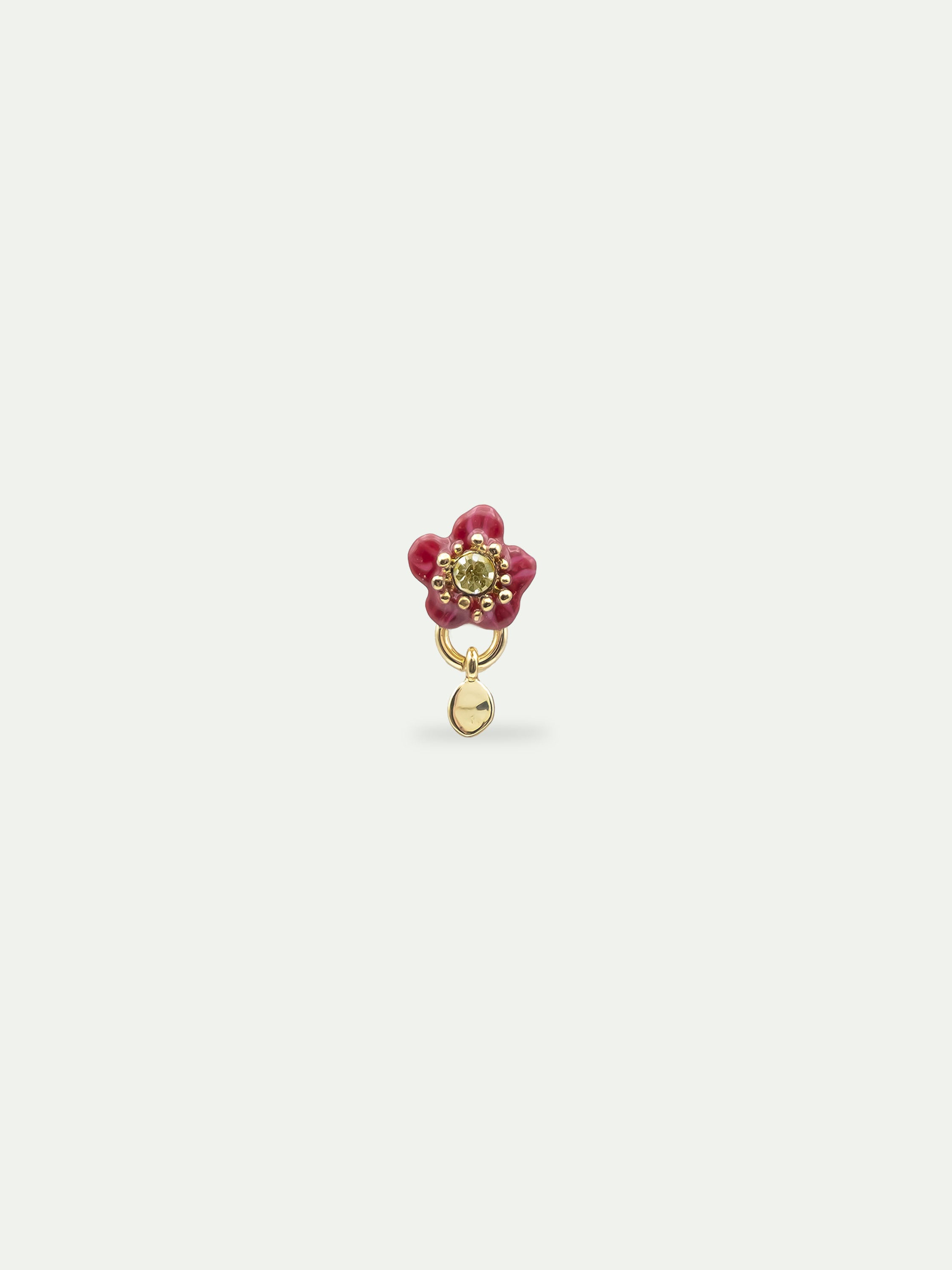 Single earring with a purple flower and a faceted stone