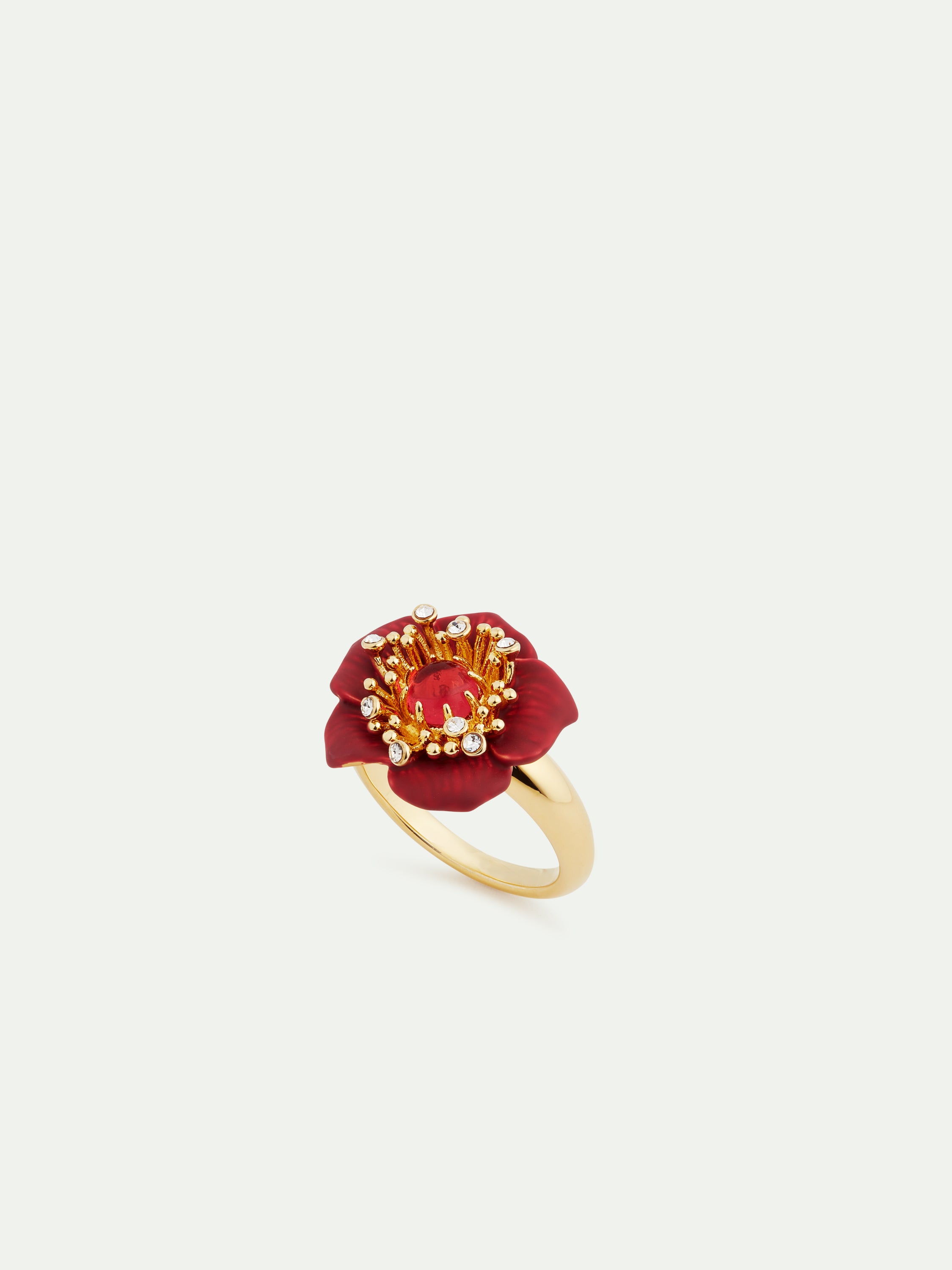 Fine ring with red hellebore flower