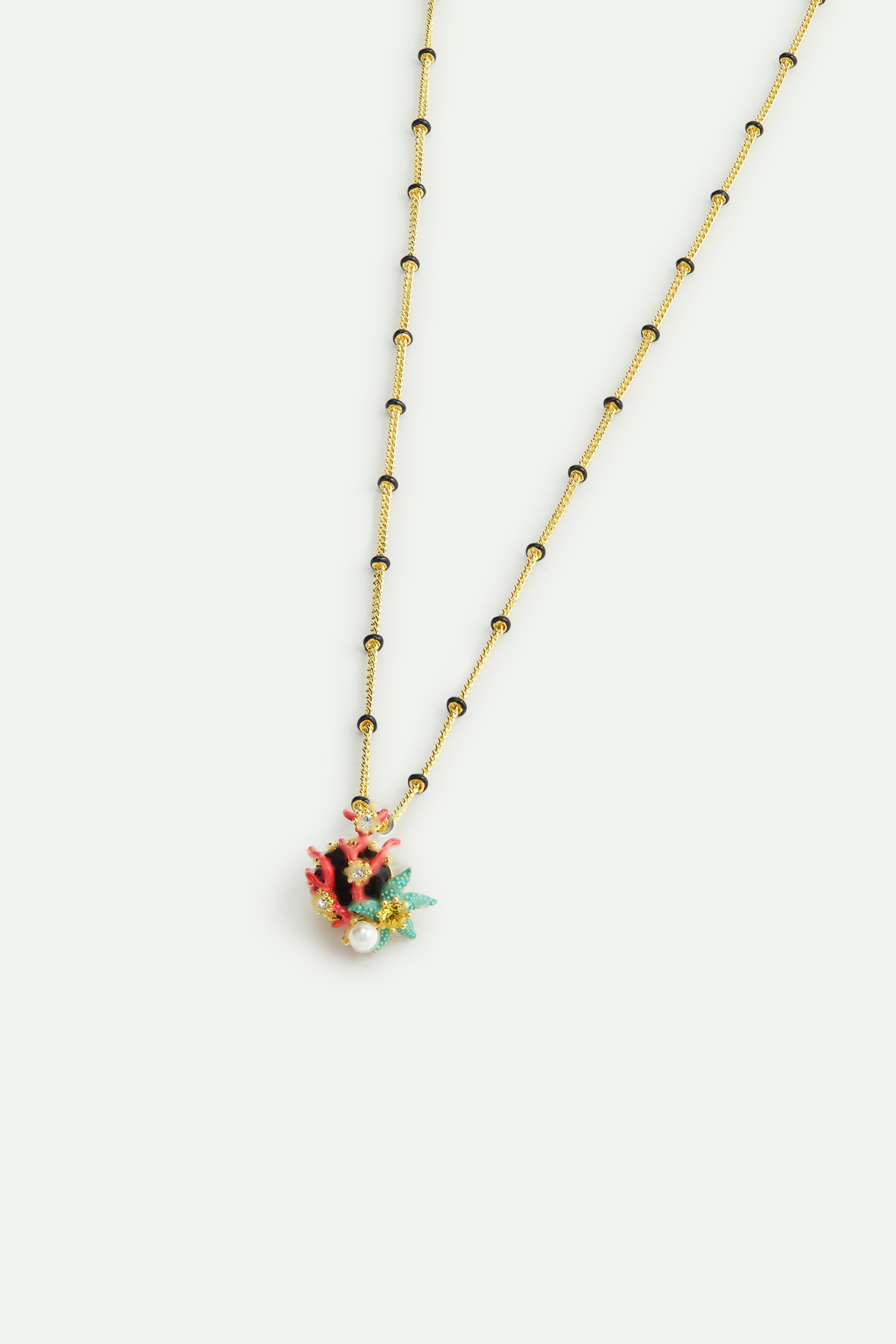 Pendant necklace with round black faceted glass stone, blue starfish and cultured pearl
