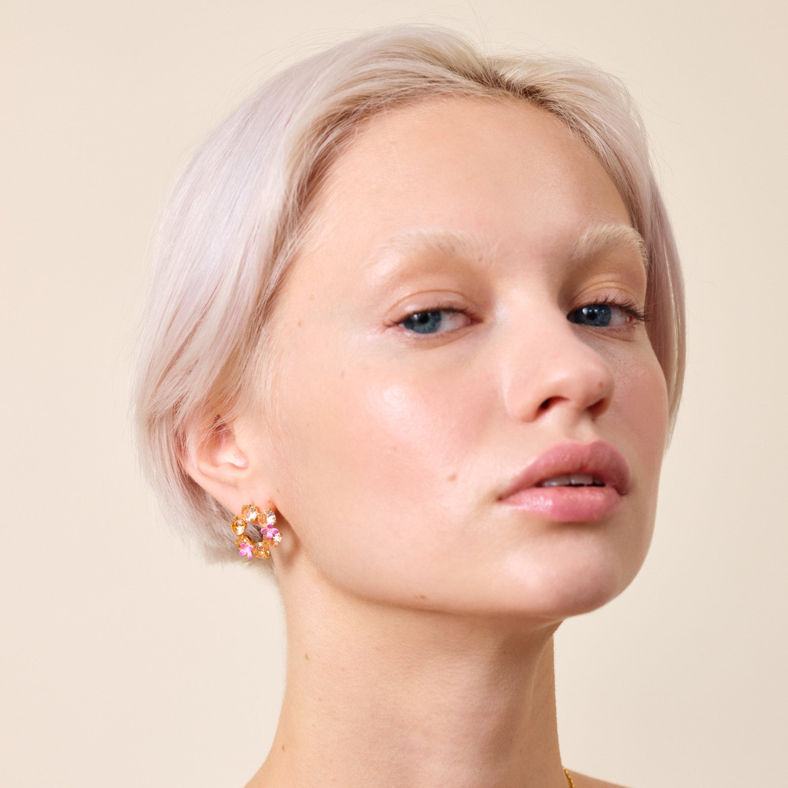 Apricot pink diamantine flower and 6 round stone earrings