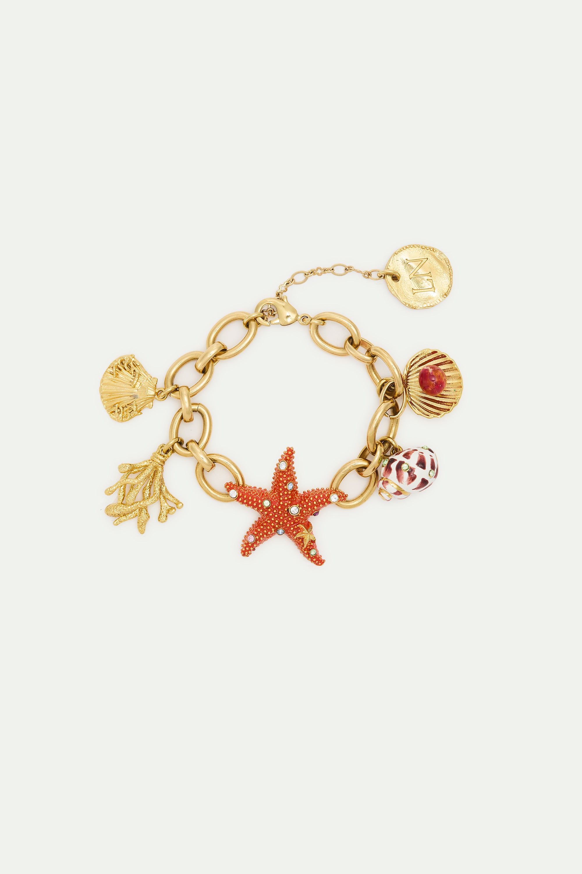 Golden starfish bracelet with shell pendants