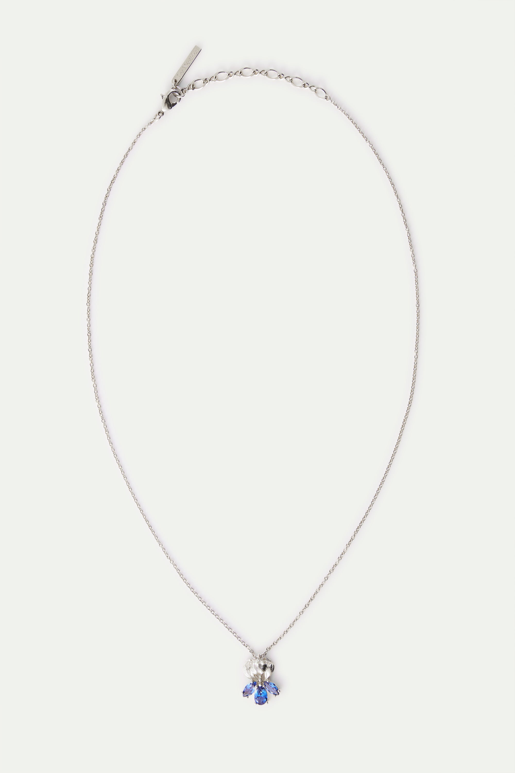 Silver iris flower and blue stone pendant necklace