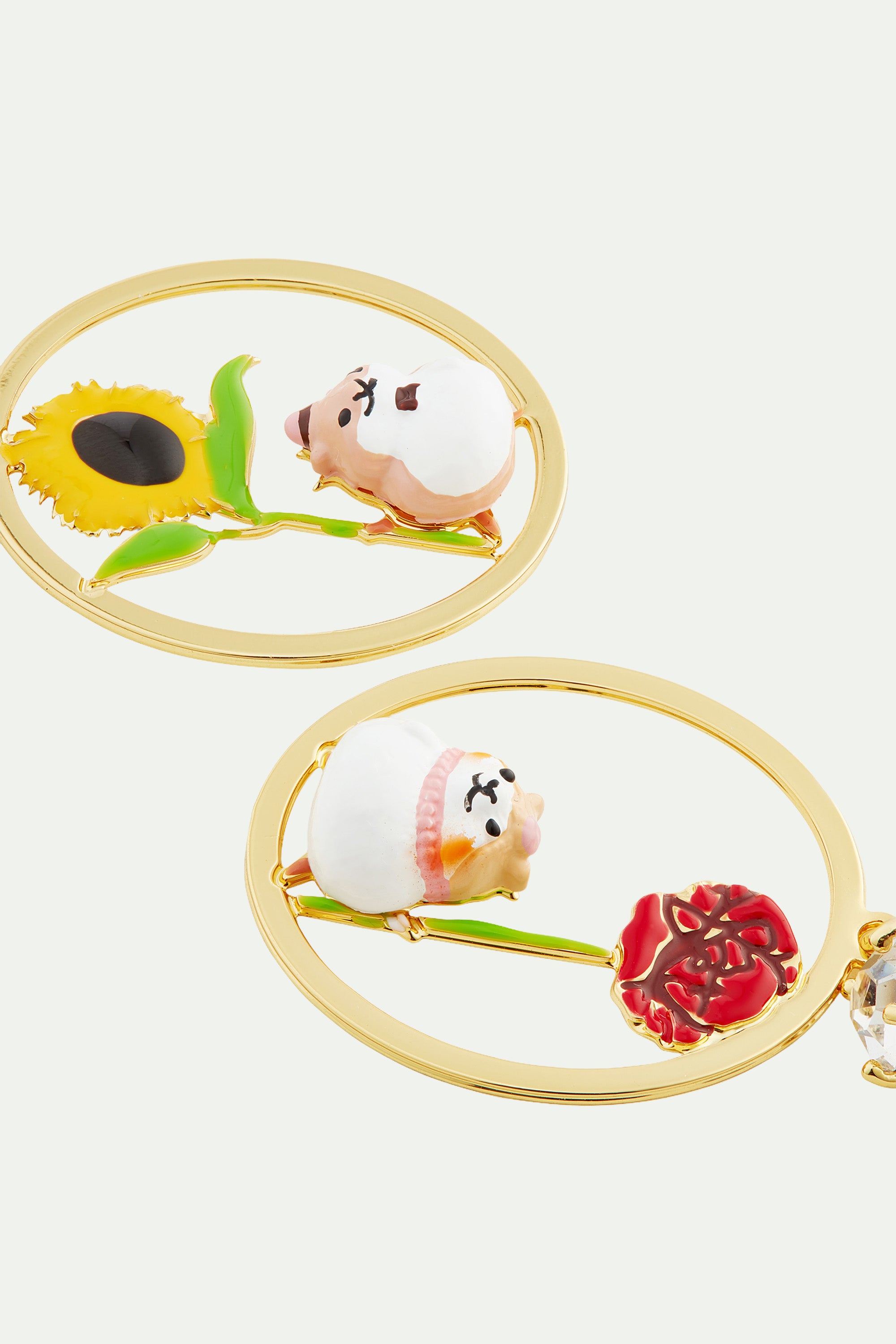 Hamster and flower asymmetrical earrings